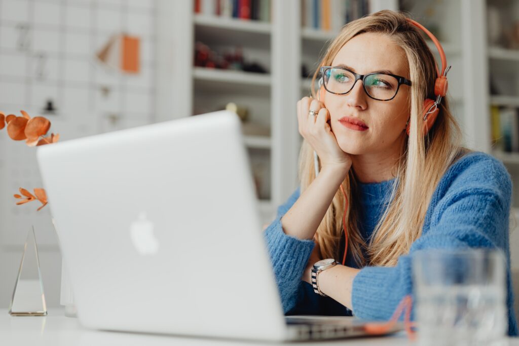 woman listening to podcast